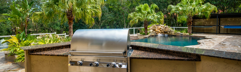 An outdoor grilling station for summer kitchen