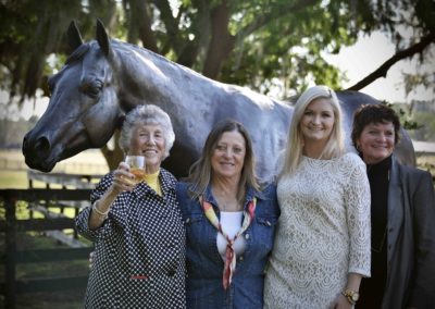 Carol Harris with attendees at Bo-Bett Farm