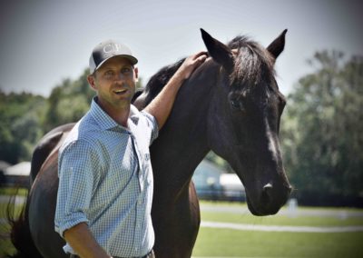 A man with his horse.