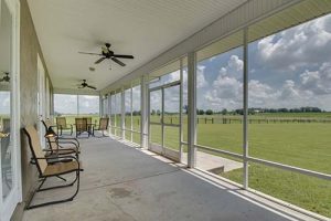 An enormous screen porch with a lovely view.