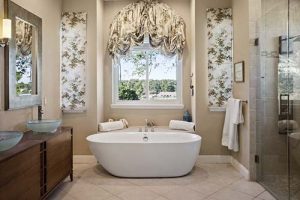 A stunning master bathroom with a large tub.