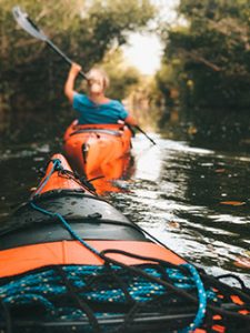 People kayaking on the river.