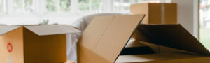 Moving boxes in various stages of being unpacked.