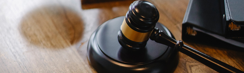 A judge's gavel in a courtroom