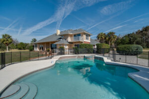 A view from the poolside facing the home.
