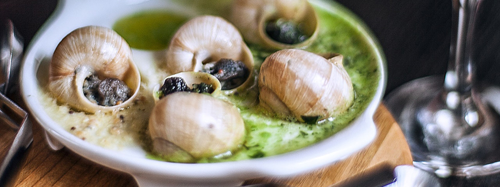 Escargots in herb butter.