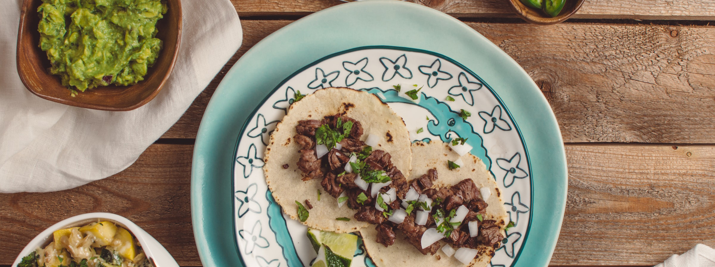 A plate of tacos with all the fixin's