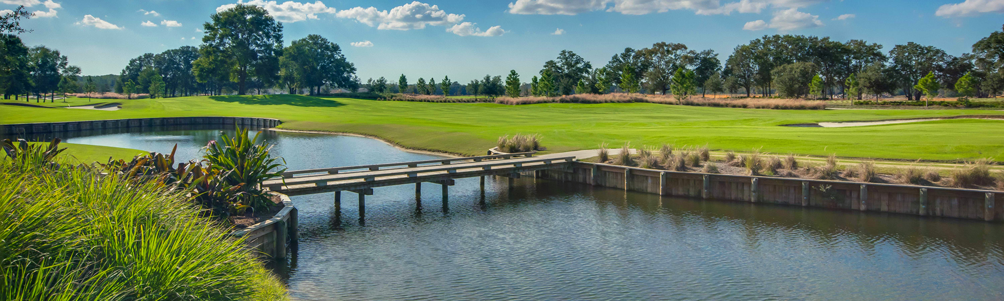 A bridge to the golf course at Ocala Preserve.