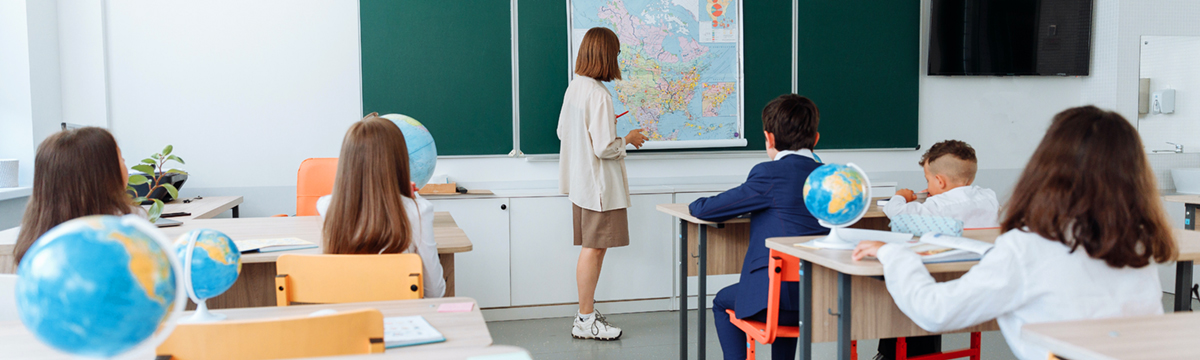 A teacher teaching a class of students.