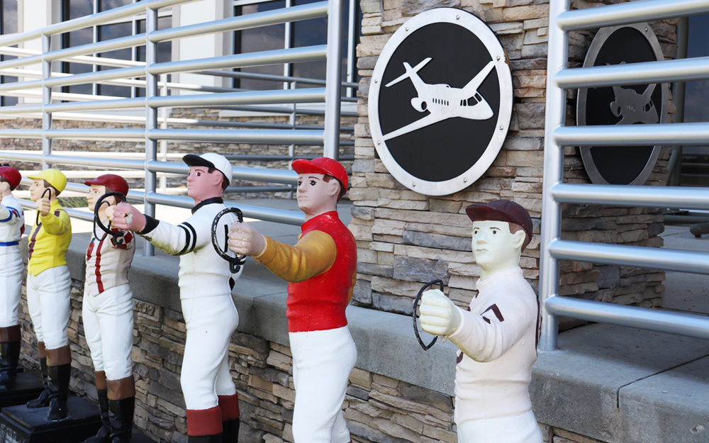 A line of lawn jockeys at the Ocala International Airport.