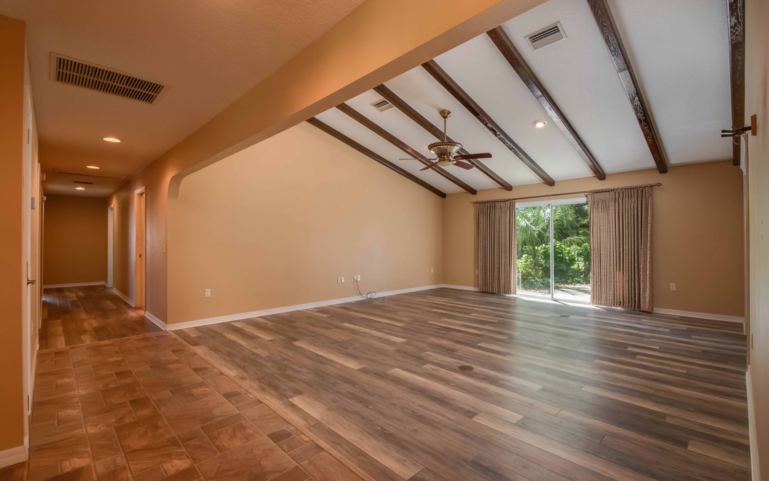 The beautiful wood-beamed ceiling of the living room at Pleasant Oaks
