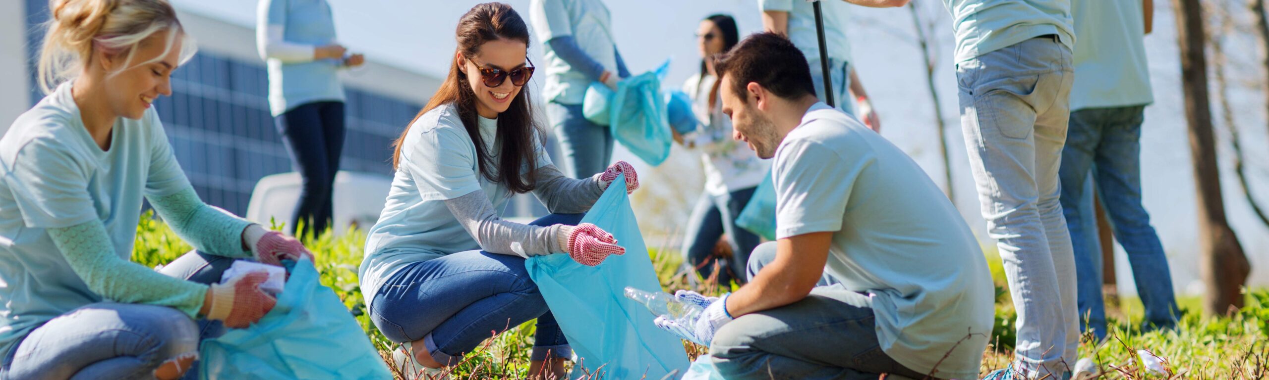 Volunteers cleaning up trash.