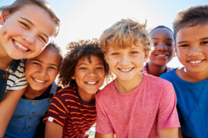 A group of smiling children.