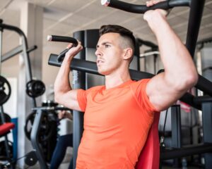 A man working out at the gym.