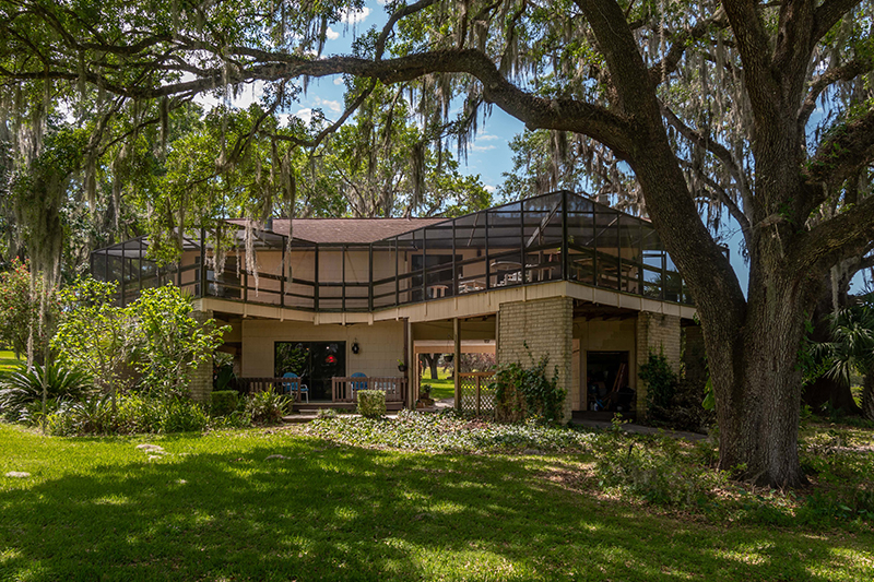 A view of the back of the home at 7669 NW 56th Place, Ocala, Florida 34482