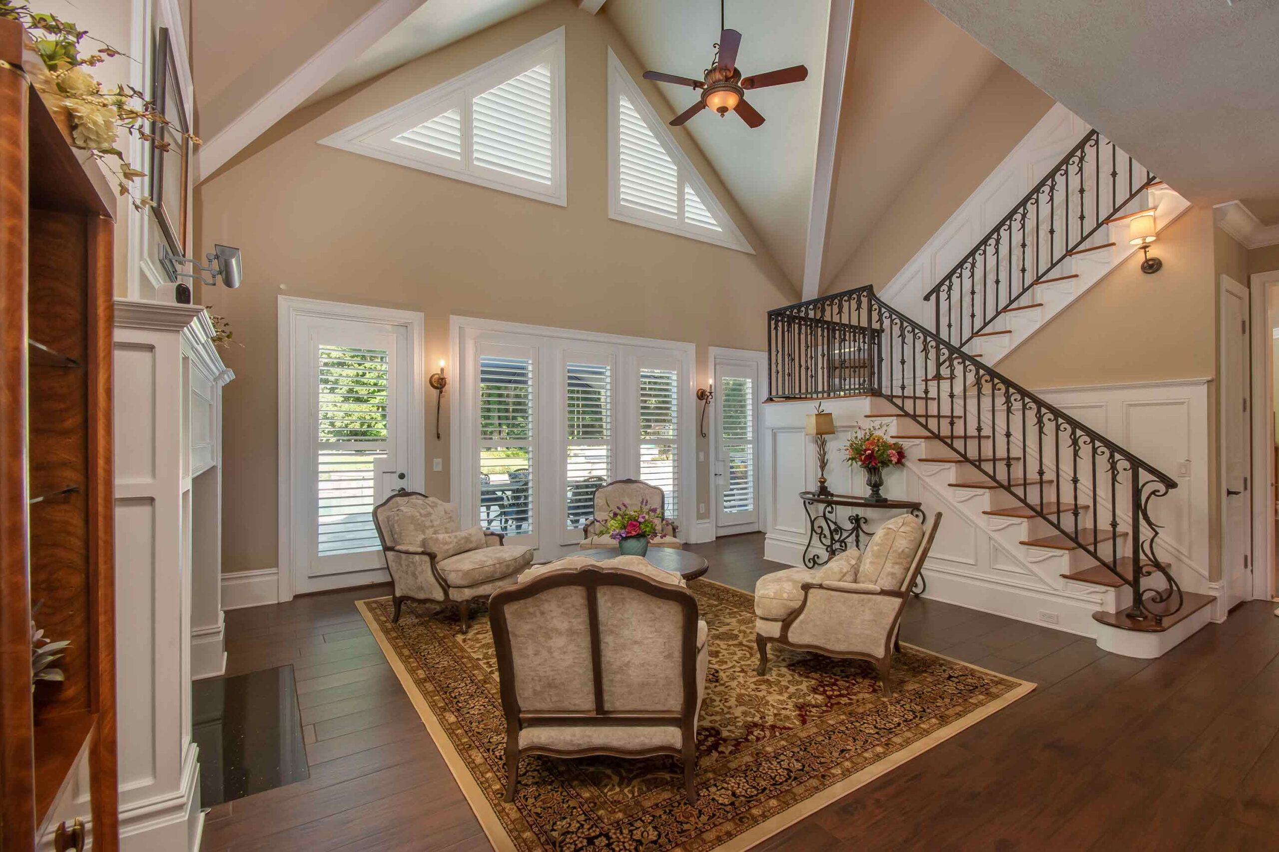 A view of the living room with a fireplace.