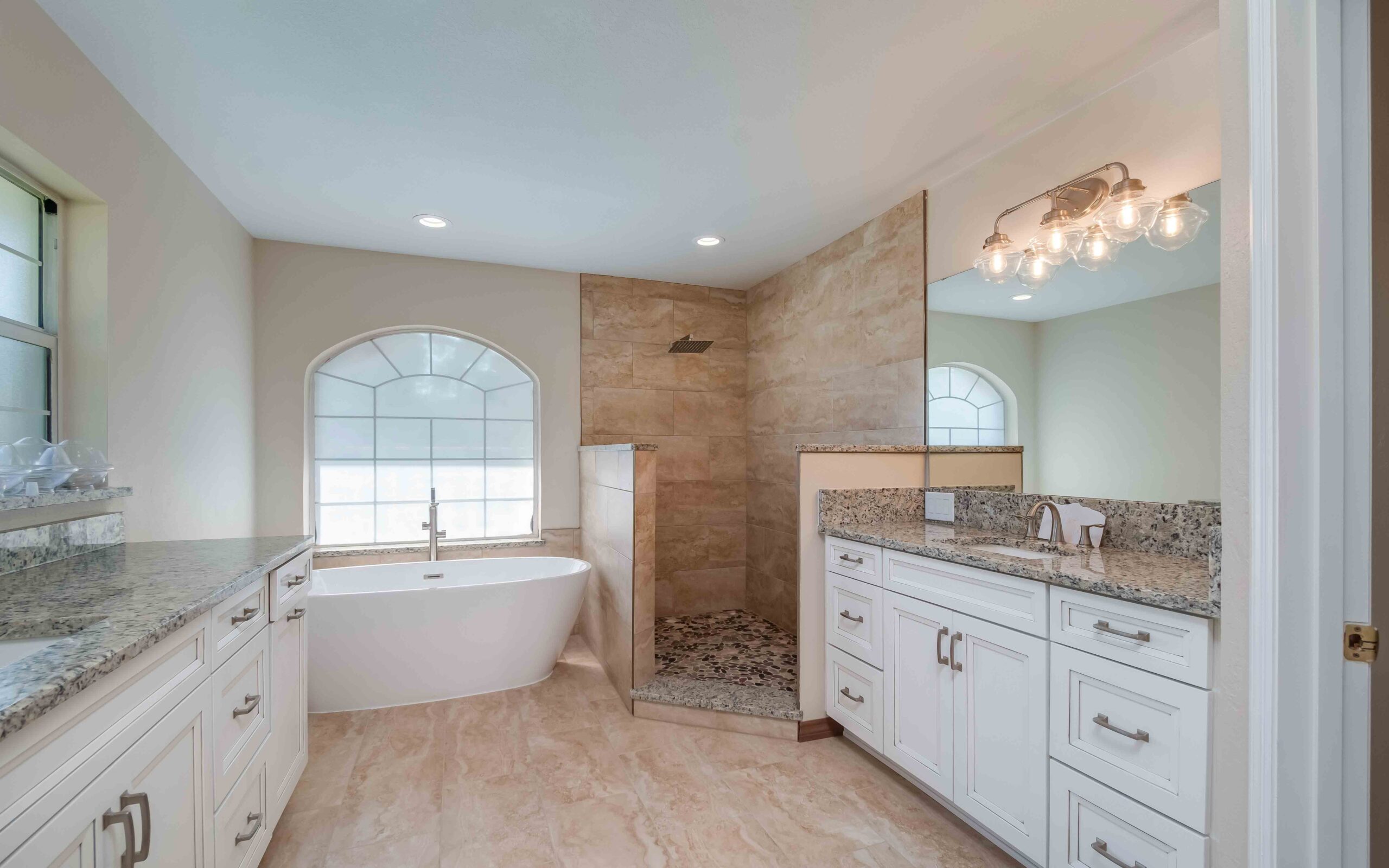 The luxurious master bathroom at 1011 NE 122nd Street, Ocala, FL 34479