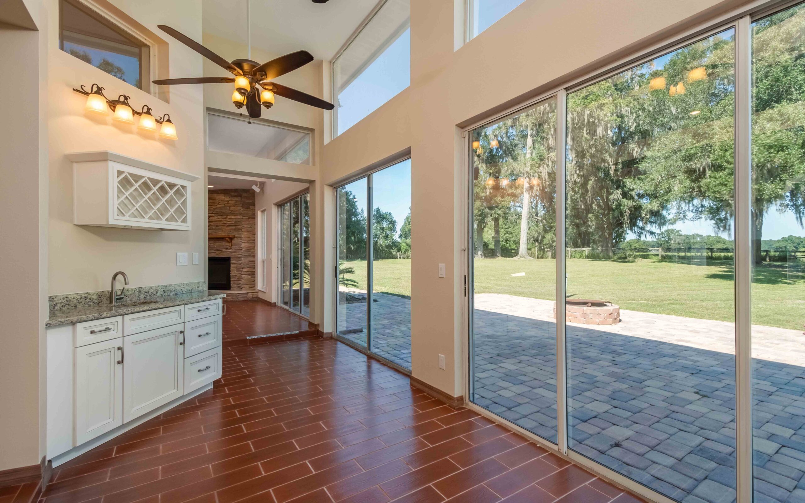 A view of the expansive windows of 1011 NE 122nd Street, Ocala, FL 34479