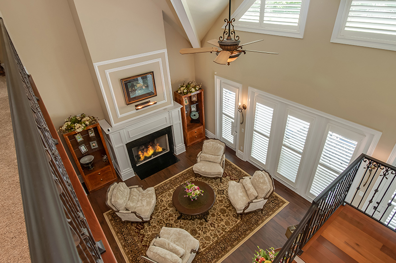 Top floor view of living room with fireplace