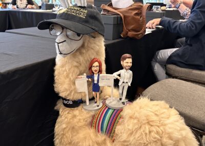 Roxanne Free's and Chris Workman's Bobble heads with Alpaca Bob