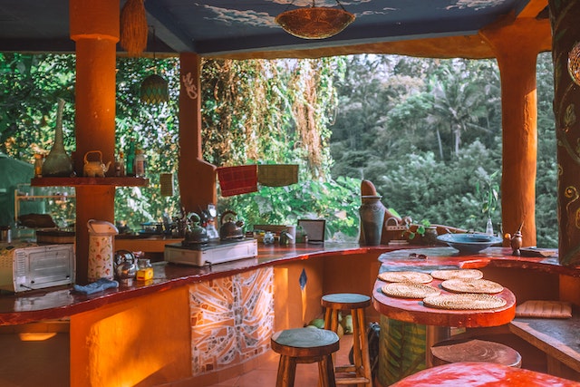 An outdoor kitchen and dining area