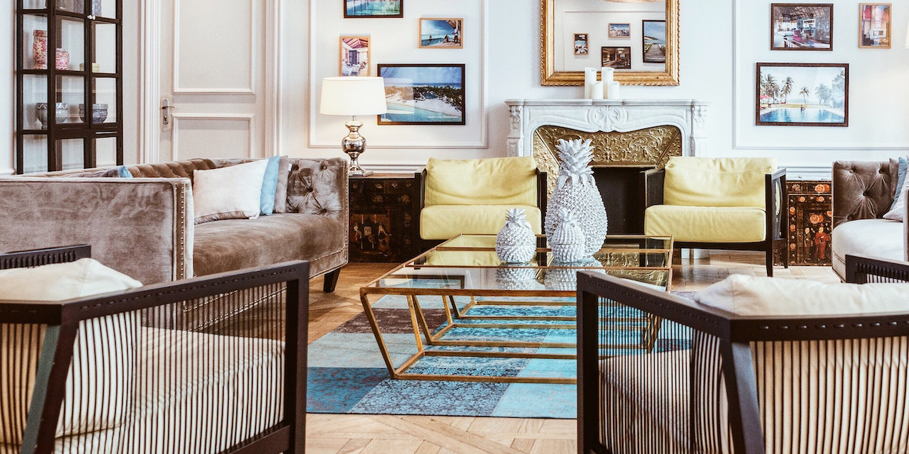 A beautiful living room in shades of yellow and light blue.