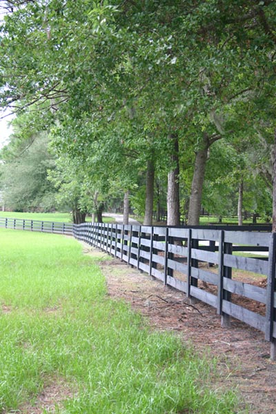 A gambrel roofed red barn.