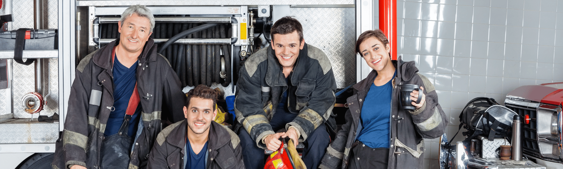 Group of firefighters at a fire station