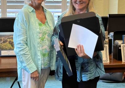 Valerie presenting Mary Durr with her award.