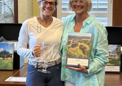 Valerie presenting Liz Gray with her award.